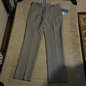 Gray slim fit, Perry Ellis dress pants. 30 X32